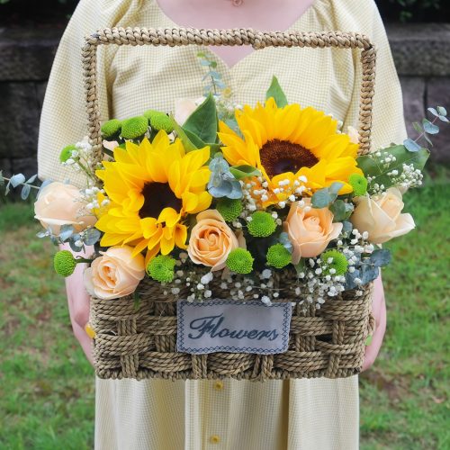 2 Sunflowers & 11 Champagne Roses Flower Basket – First Impression Sunflowers & Champagne Roses Flower Basket | Elegant Floral Gift