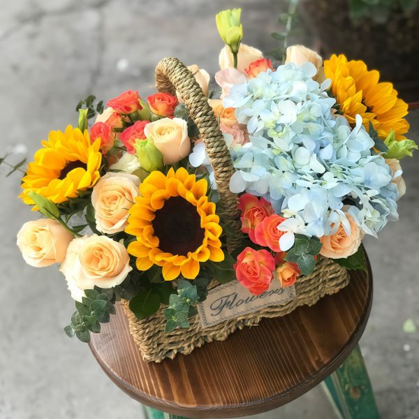Dreamy Garden Basket: Hydrangeas, Sunflowers & Roses Bouquet