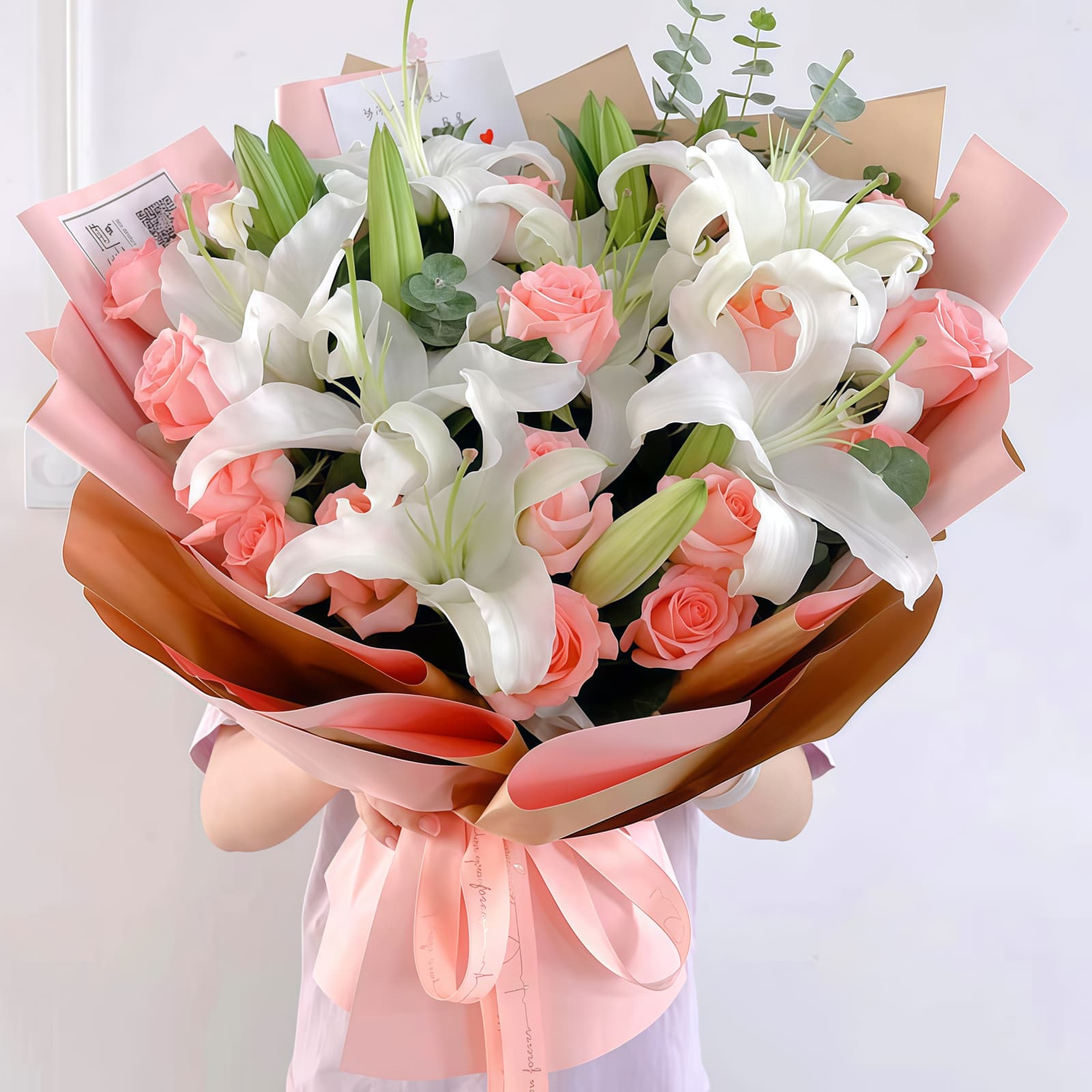 19 Pink Roses & 11 Lilies Bouquet – Soft Romance 19 Pink Roses & 11 Lilies Bouquet - Soft Romance Floral Arrangement